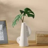 CALYPSO TWO TONE 8H” WHITE CERAMIC TAPERED VASE