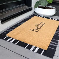 Printed layered floor Hello outdoor mat